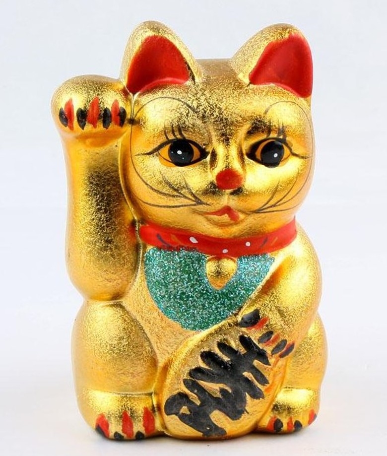 招财猫左手右手寓意，左迎宾客，右纳财富插图